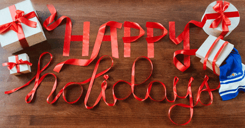 gif of ribbon forming happy holidays