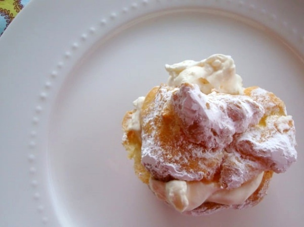 cream puff on white plate seen from above